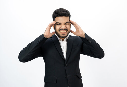 Depressed stressed. Young asian businessman on isolated white background. Angry middle aged Indian businessman in office uniform.