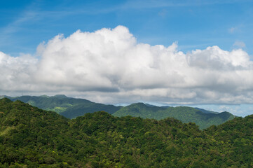 Fototapeta na wymiar Blue Sky Majesty: Capturing the Dynamic White Clouds on the Mountain. The Wufenshan Weather Radar Station stands on the top of the mountain. Taiwan