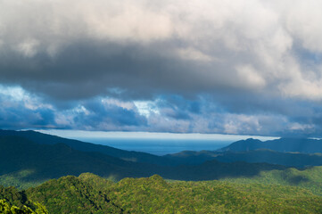 Nature's Canvas: Dynamic White Clouds Drifting Across the Mountain's Blue Sky. The Wufenshan Weather Radar Station stands on the top of the mountain. Taiwan