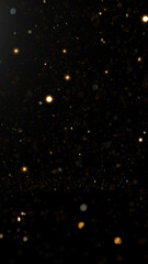 Fototapeta na wymiar 黒い背景にゴールドの紙吹雪の輝き。（縦長）