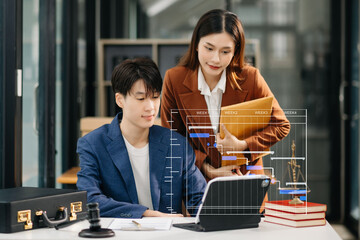 Asian business team and lawyers discussing contract papers sitting at the table. Concepts of law,...