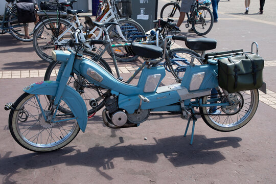 mobylette french vintage retro old moped modified into a two-seater tandem oldtimer ancient scooter