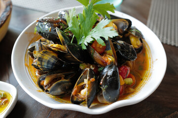 Close up steamed mussels pot