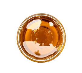 Mustard oil bowl on white background, top view