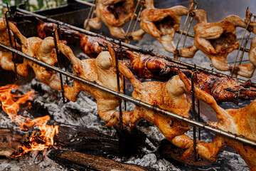 Huli-huli chicken is a grilled chicken dish in Hawaiian cuisine, prepared by barbecuing a chicken over mesquite wood, Prosopis pallida , kiawe