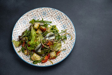 A delicious salad in a restaurant. Close-up