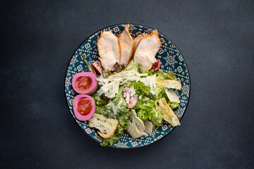 A delicious salad in a restaurant. Close-up