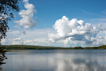 Naklejka na ściany i meble clouds over the lake, jämtland,sweden,sverige,norrland,Mats