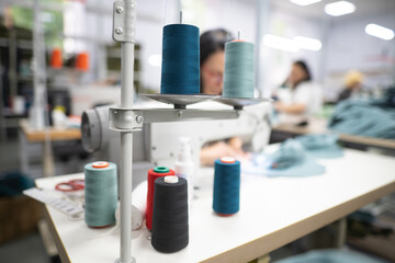 close-up of skeins of thread at an industrial sewing factory for tailoring clothes