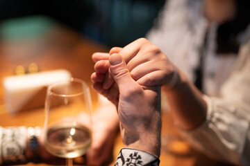 close-up of a couple in love holding hands
