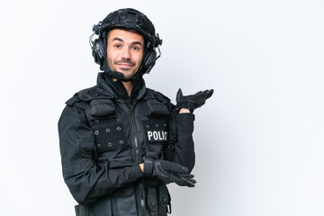 Young caucasian SWAT man isolated on white background extending hands to the side for inviting to come
