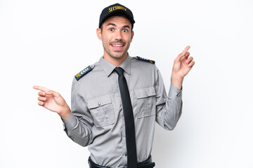 Young safeguard man over isolated white background pointing finger to the laterals and happy