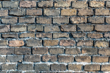 breautiful colorful old brick wall background for wallpaper and design concept, vintage wall with yellow and brown , old texture of vintage building backdrop