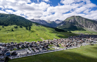 Livigno village ski and Bikepark valley in Valtellina, Lombardia, Italy Aerial view Drone panoramic...