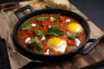 Delicious breakfast. eggs fried in a pan. Close-up