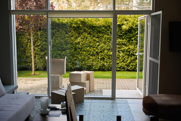 View of garden through glass of modern room