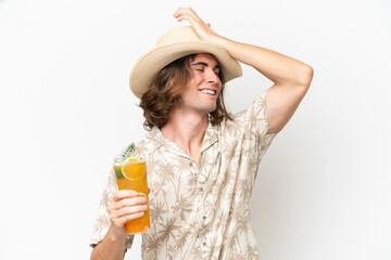 Young handsome man holding a cocktail isolated on white background has realized something and intending the solution