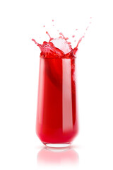 Berry red fresh juice in glass with reflection, bright colorful splashes, flying drops and swirl isolated on white background. Summer refreshing sweet vegetarian beverage.