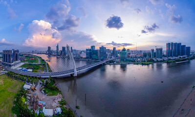 Fototapeta premium Sunset on Saigon riverside, Ho Chi Minh city Vietnam. Photo taken on 15th July, 2023.