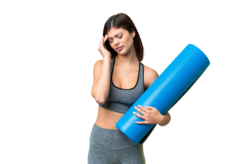 Young sport woman going to yoga classes while holding a mat over isolated chroma key background with headache