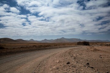 View of the strange, unfriendly but fascinating deserted landscape of the island volcanoes of the center of Fuerteventura. North part of the island.