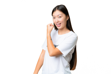 Young volunteer woman over isolated chroma key background celebrating a victory