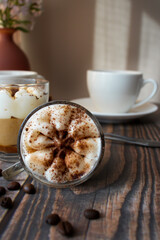 
Coffee drink. On a wooden background. Morning.