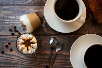 
Coffee drink. On a wooden background. Morning.