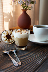 
Coffee drink. On a wooden background. Morning.