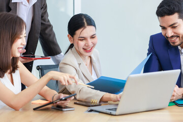 Asian Professional successful female business explaining discussing brainstorming with boss and female business colleagues in formal business suit discussing brainstorming working as teamwork