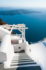 Fototapeta na wymiar White architecture in Santorini island, Greece. Blue sea and the blue sky