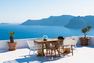 Gordijnen White architecture in Santorini island, Greece. Beautiful terrace with sea view. © smallredgirl