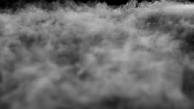 Smoke streaming over the ground. Video in a loop. Can be used as a special effect for your projects, video texture or background for designs, scenes, etc.

