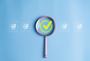 Magnifier enlarging the correct or check mark on blue background. Business industrial quality control and voting concept. Approval and Contract assignment theme. - obrazy, fototapety, plakaty