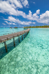 Fototapeta premium Amazing panorama blue sea seascape, sunshine sky clouds. Travel relax calm landscape of Maldives beach coast. Tropical island, luxury water villa resort wooden pier. Vacation destination tranquility