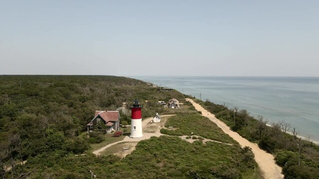 Nauset Light - Restored Lighthouse On The Cape Cod National Seashore Near Eastham In Massachusetts, USA. aerial orbit