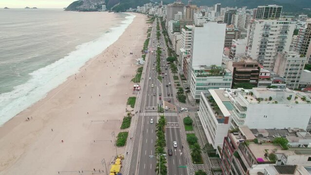 Bird's eye view of Vieira Souto Ave. in Leblon with low traffic in Rio de Janeiro Brazil