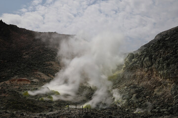 Sulphur pieces on Iozan (sulfur mountain) active volcano area, Akan National Park, Hokkaido, Japan