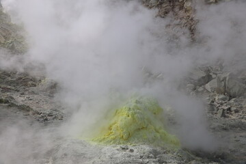 Sulphur pieces on Iozan (sulfur mountain) active volcano area, Akan National Park, Hokkaido, Japan