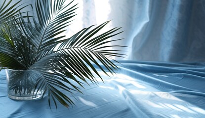 Tropical palm leaves in a vase on a white table