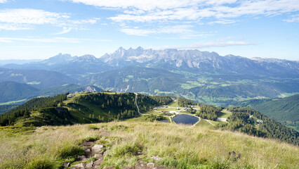 Fototapeta na wymiar Reiteralm loop hiking trail with views on the Dachstein Mountains in Schladming, Austria.
