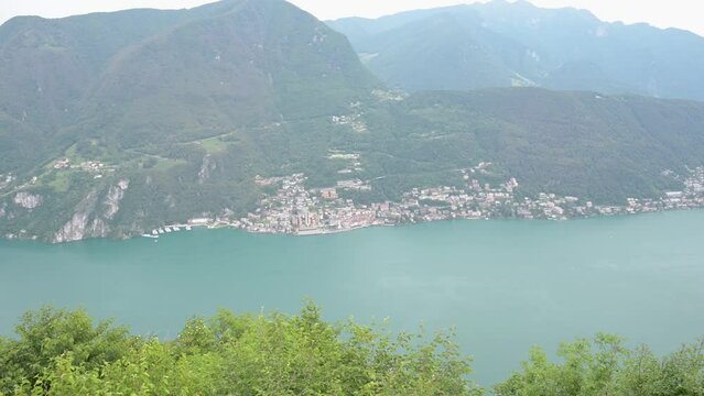 Panoramic view from the summit of Mount San Salvatore, Lugano, Switzerland, towards Campione d'Italia, Melide and Bissone