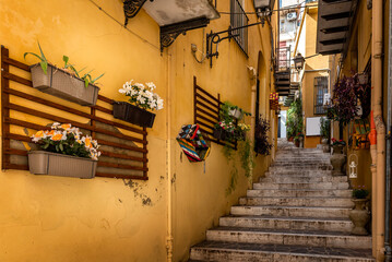 Colorful Narrow street with stairs of the old town of Agrigento, Sicily, Italy