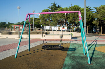 circular seat swing in a playground