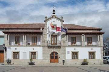 Town hall building of the Villa de los Molinos, province of Madrid. Spain the street sign says spain square