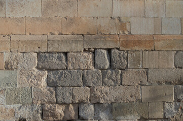 background wall formed by large blocks of stone