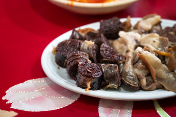 Delicious Korean cuisine Sundae and other pork edible viscera in market, street food.