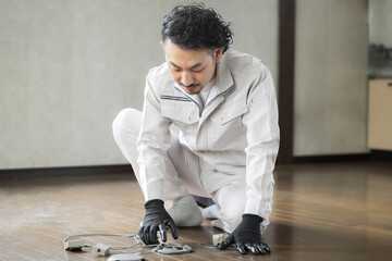 Electricians who work with power distribution and wiring Electricians