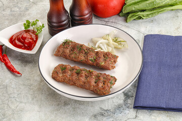 Kebab with beef served onion