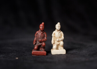 Chinese vintage chess piece of pawn portraying Terra cotta army of first emperor of China named Qin Shi Huang
